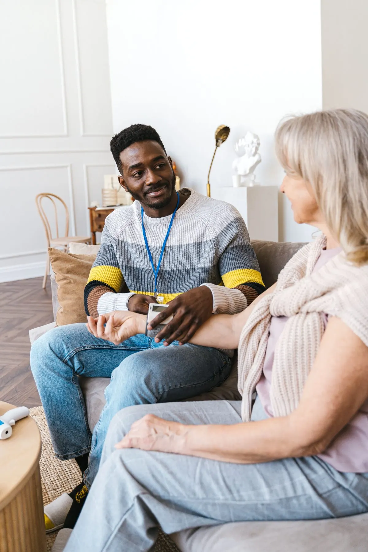 A home care worker spending time with an older client